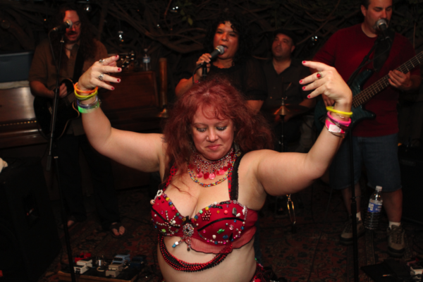 Ex-Doo-Dah Queen Mickie Mills bellydances at McGinty's - photo by Gary Altadena