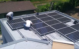 Crew_installing_solar_panels